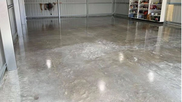 Clear polyaspartic floor coating over raw concrete