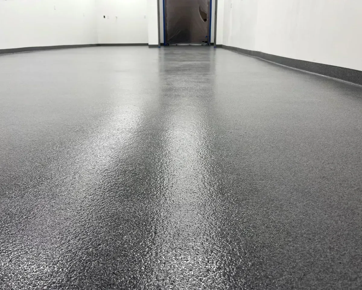 Quartz-coated concrete surface